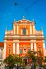 Slovenia, Ljubljana. Square and church facade. Art Print